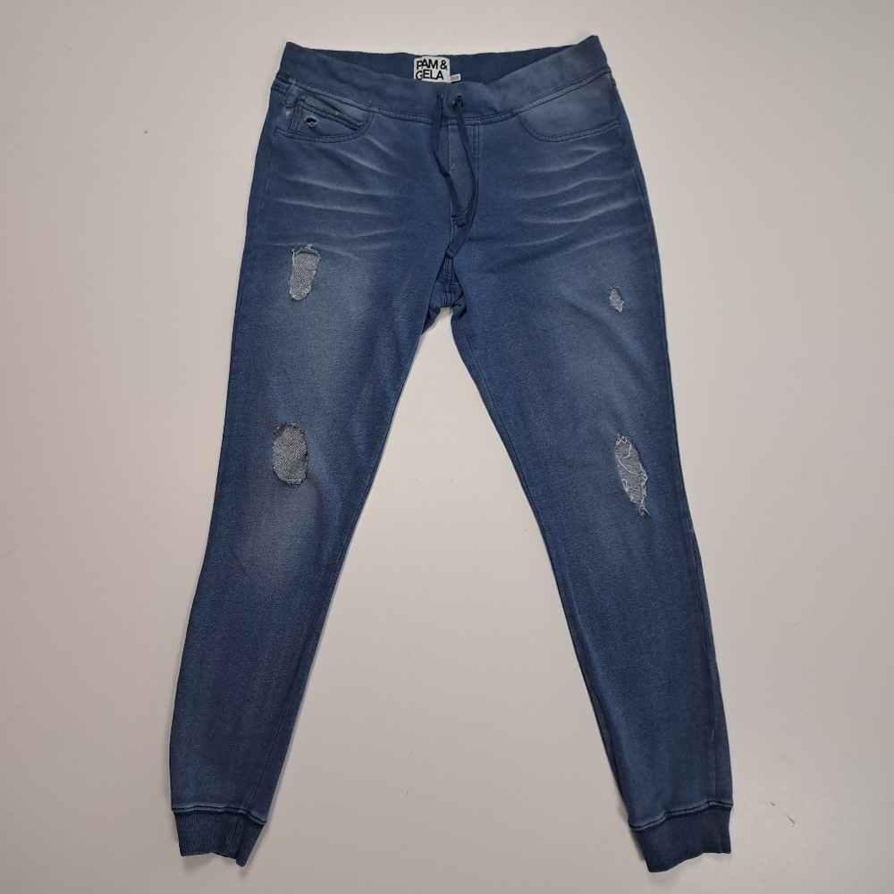 pam & gela women's stretch pants size M with hollow fashion in front.